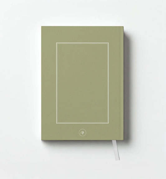 Green notebook with a white line design on a white background