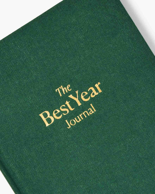Green journal with 'The Best Year Journal' text on a white background