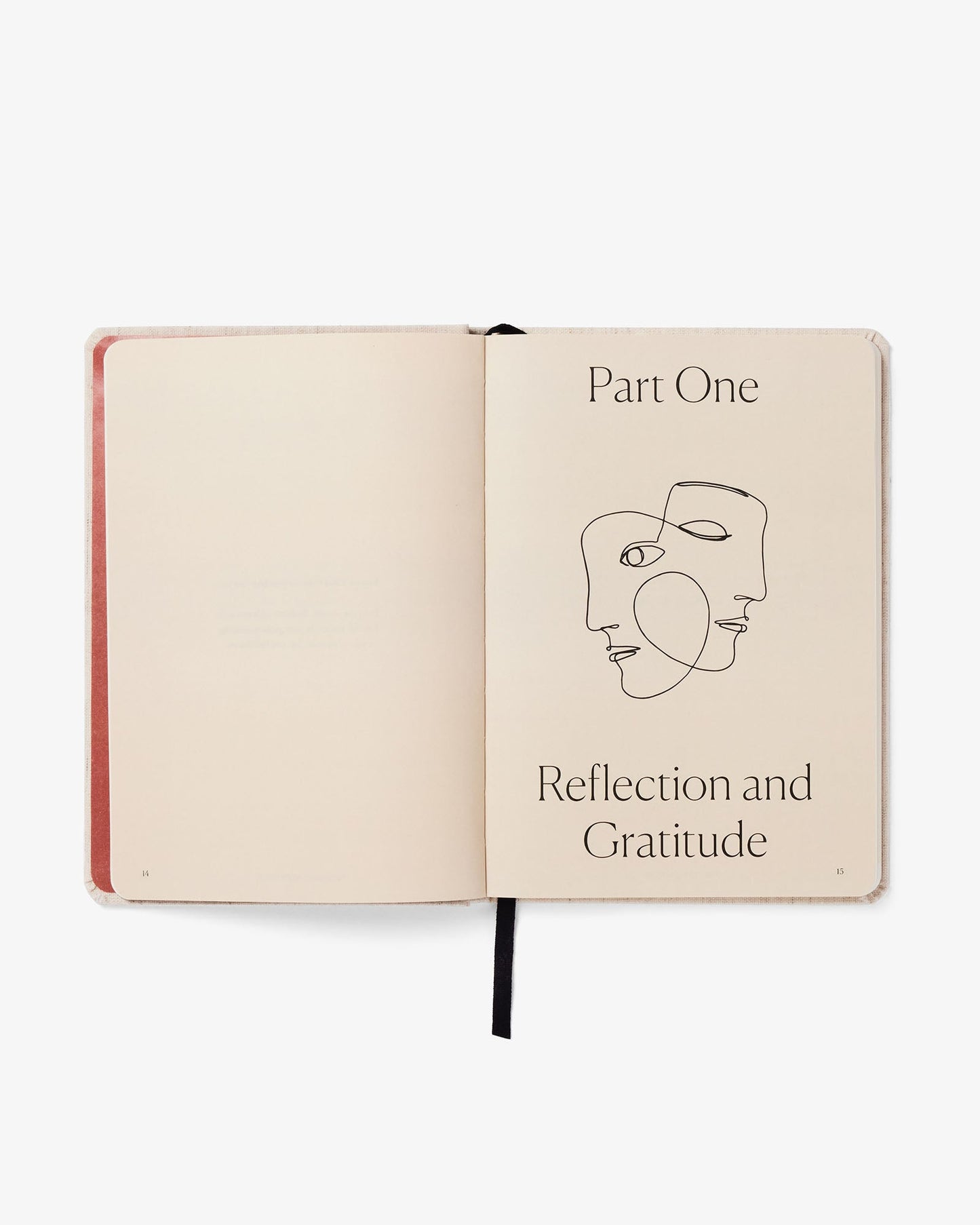 Open notebook with abstract face illustration and text on a white background