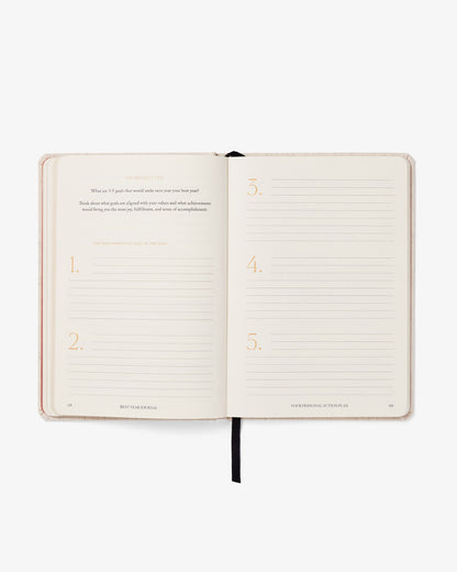 Open notebook with lined pages on a white background