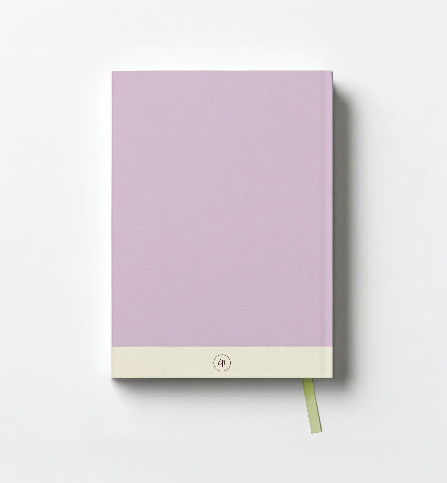 Purple notebook with a beige bottom section on a white background