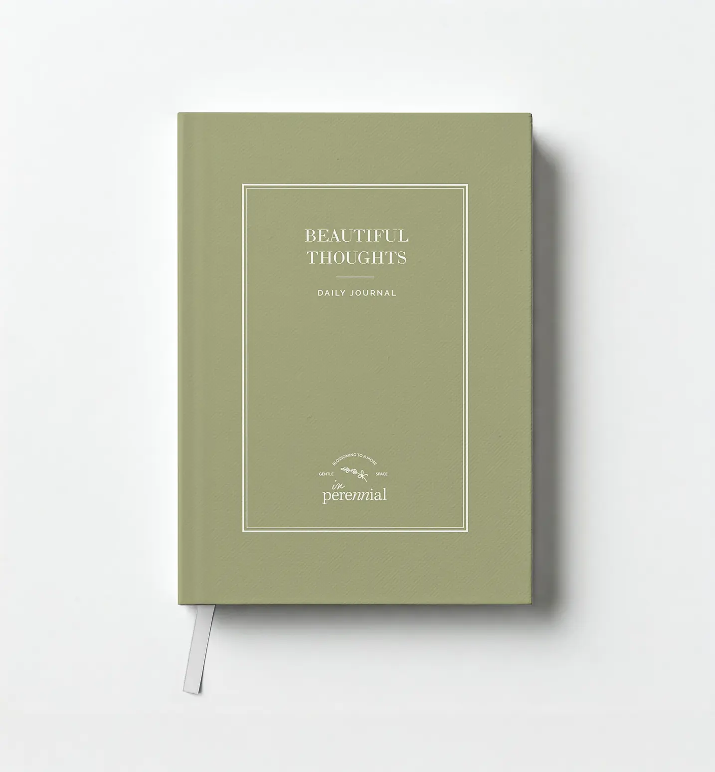 Green journal with 'Beautiful Thoughts' text on a white background
