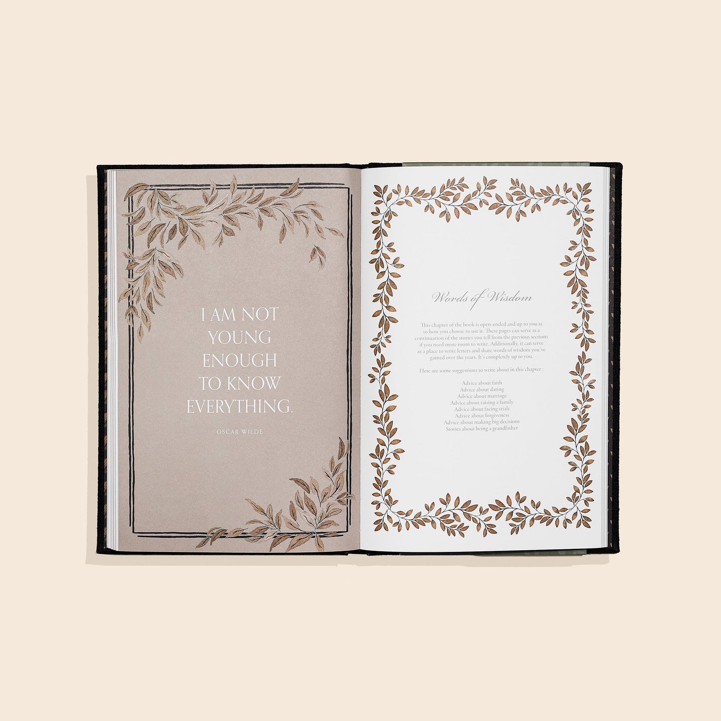 Open book with decorative pages on a beige background